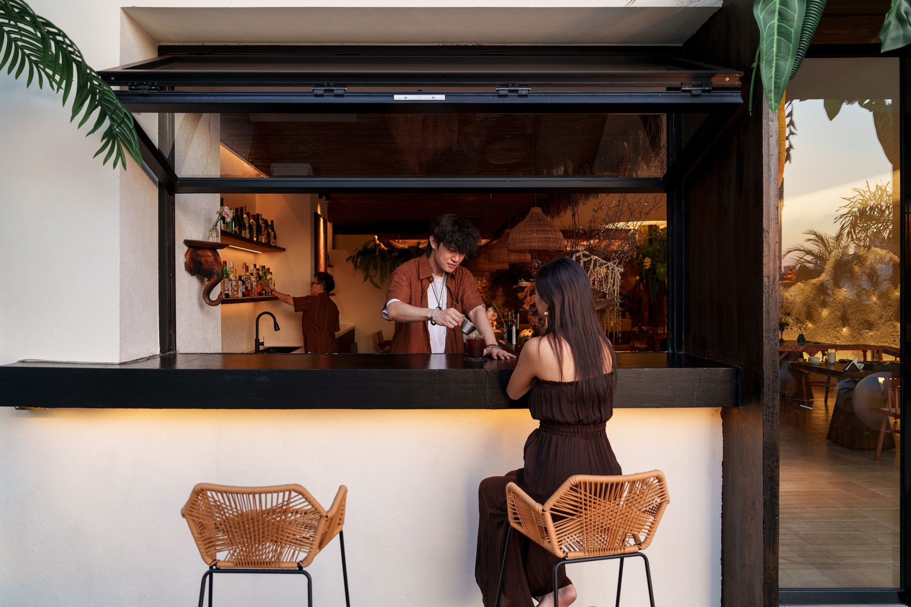 Barista pouring coffee